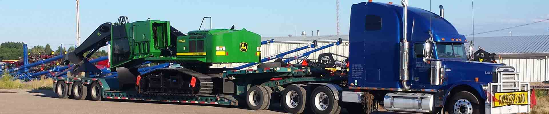 deere heavy equipment trucking canada